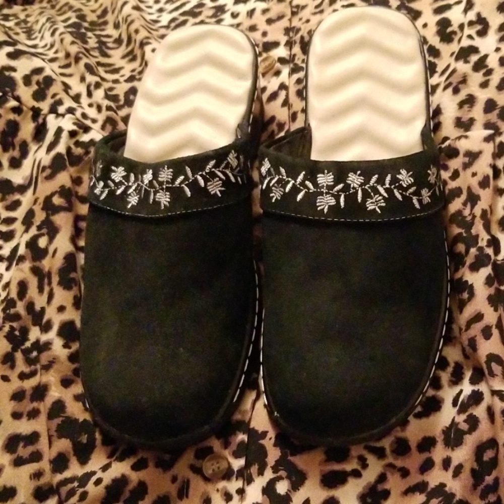 Black suede clogs in size 8.